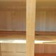 Vintage wardrobe with mirror and tapered legs.
