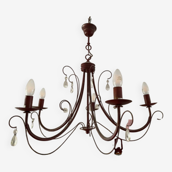 Deep red tassel and wrought iron chandelier