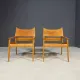 Pair of vintage wooden armchairs with leather upholstery, 20th century, 75 × 56 × 65 cm