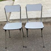 2 beige Formica and steel chairs from the 1980s.