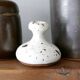White speckled black ceramic vase with a neck, 1960s.