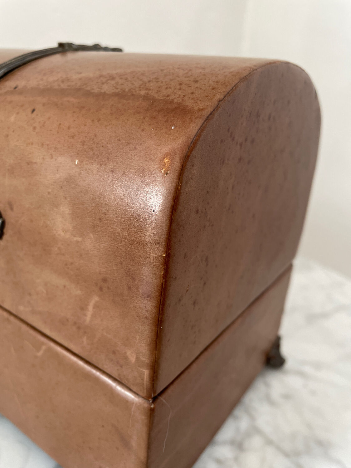 Vintage leather and silver metal jewelry box.