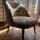 J. Tenreiro, Brazil. Concha armchair with tapered legs, Cluny tapestry 1400.