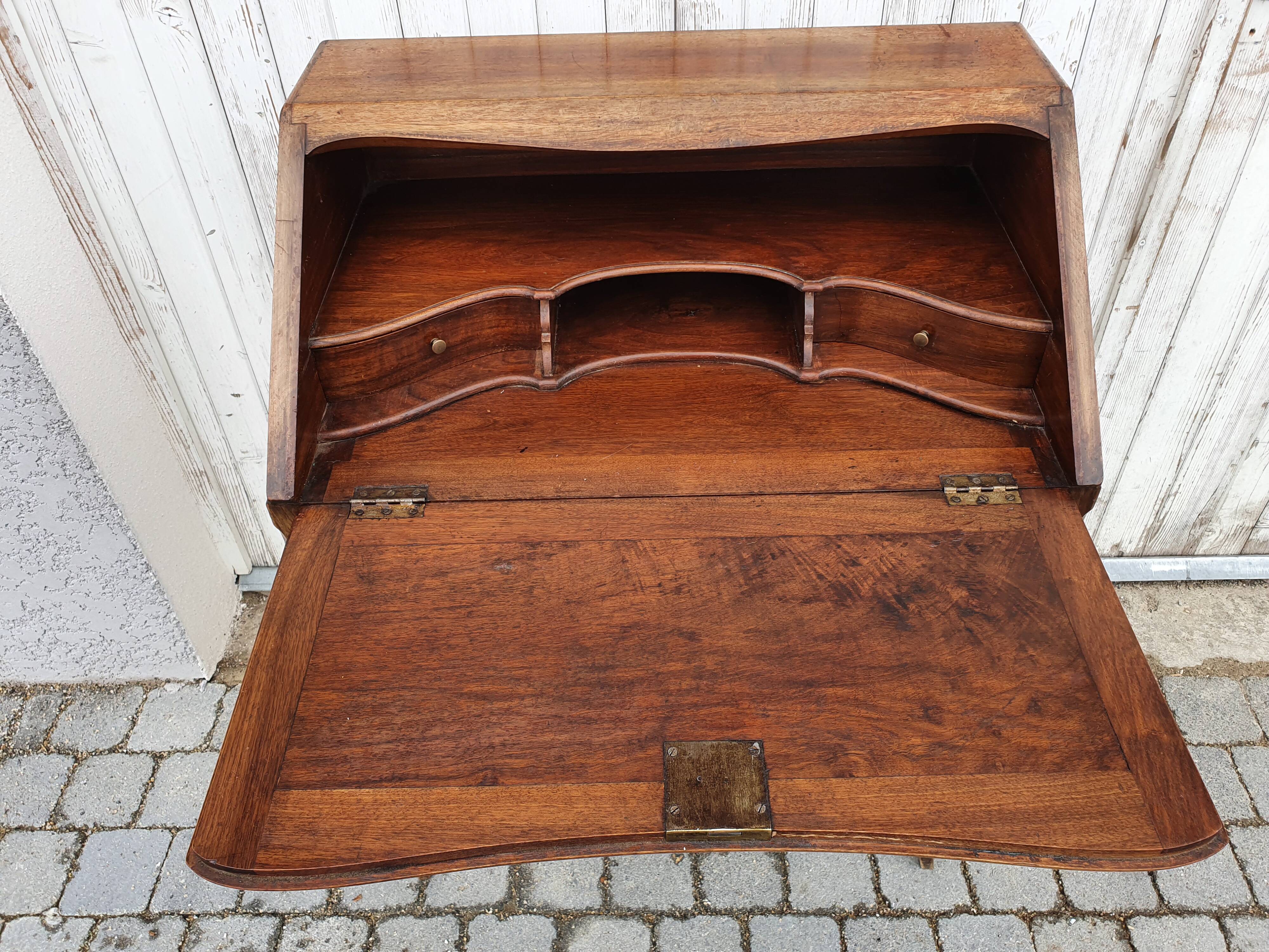 Former small secretary office with a walnut Louis XV