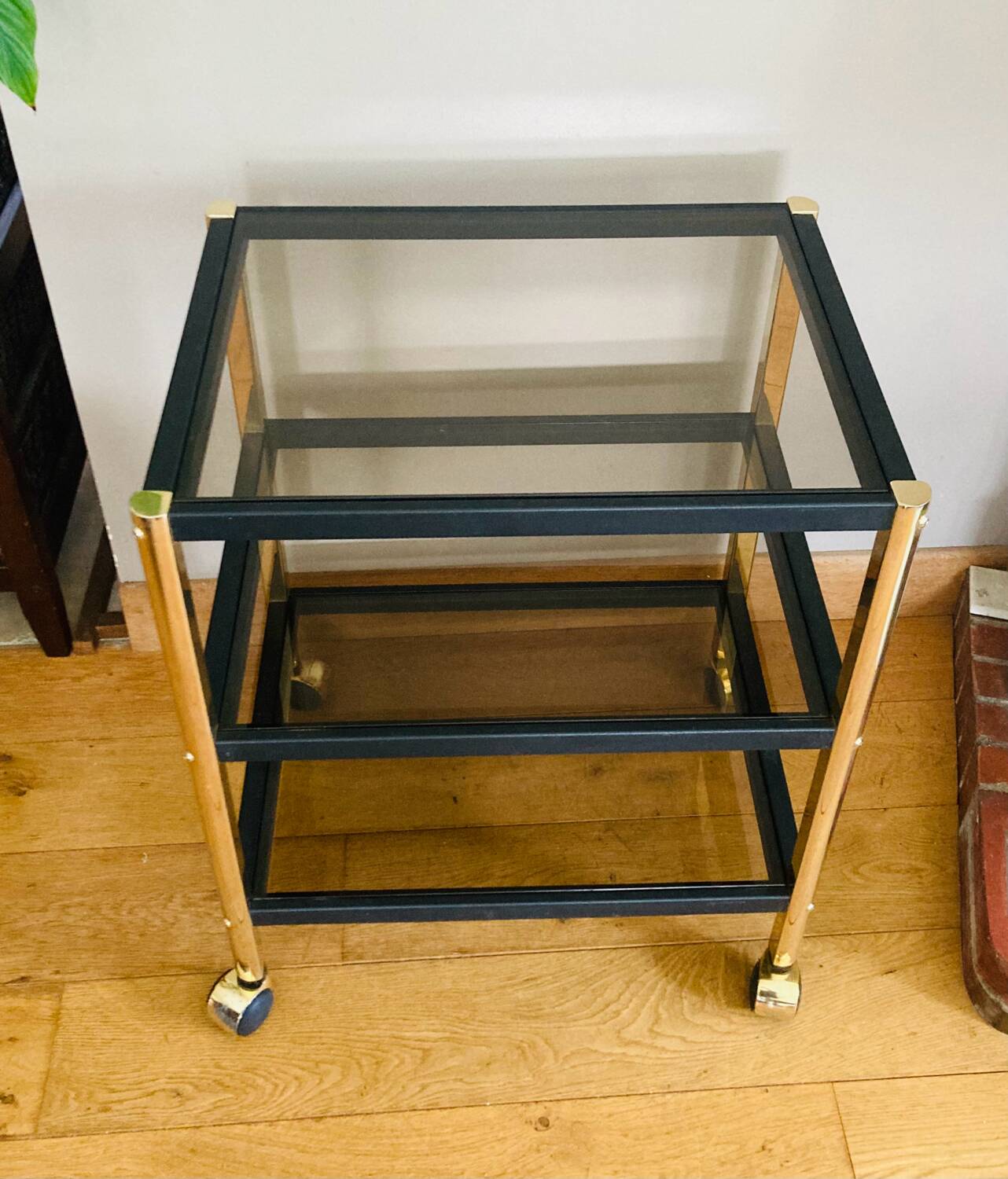 Side table in gold metal and smoked glasses 1970s