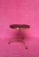 Gueridon/side table/tri-pod coffee table with a gold metal base and glass top.