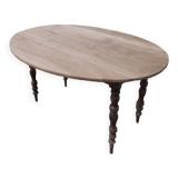 Folding oval table