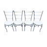 White chairs in exotic wood and wrought iron