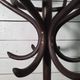 Curved antique wooden parrot