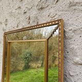 Mirror with glazing bead