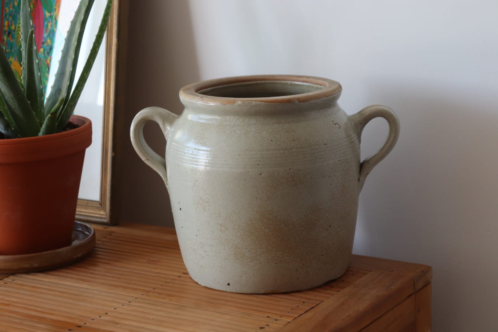 Eared beige sandstone pot