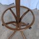 Vintage bentwood coat rack in Thonet style / Dark wood coat rack with shadow.