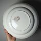Antique Longchamp shallow dish with polychrome daisies in ironstone.