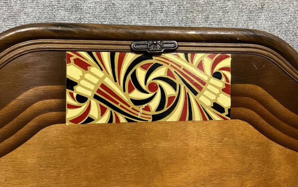 Art Nouveau period bed in painted iron faux wood with stylized colored patterns