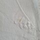 Nappe blanche brodée et 6 serviettes assorties