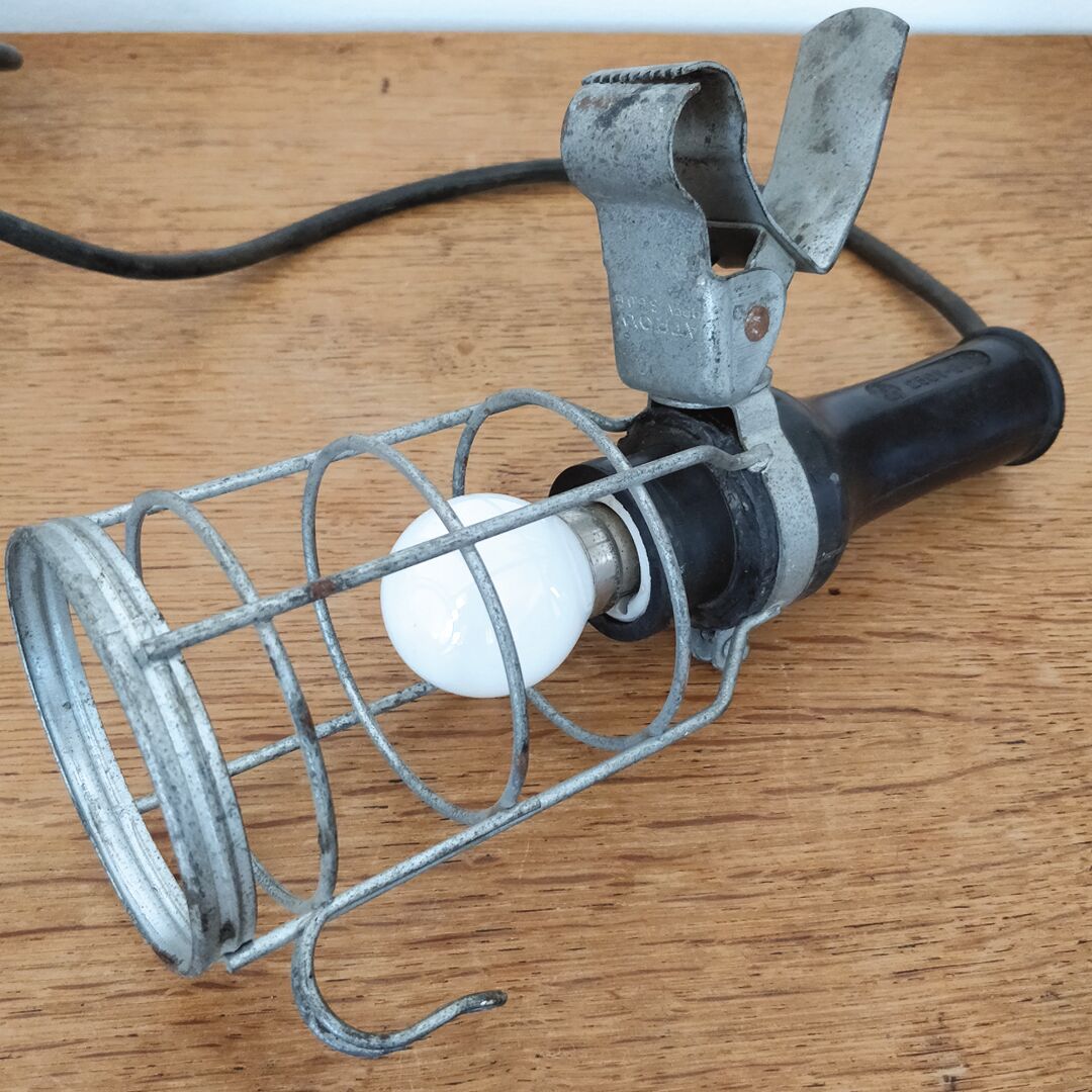 Black industrial atrow walking lamp