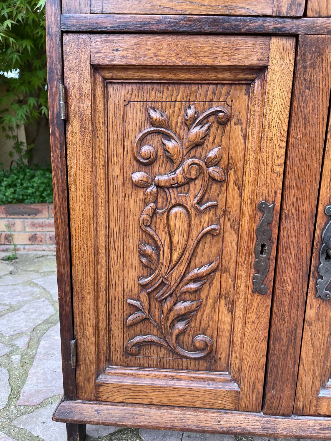 Low carved wooden sideboard