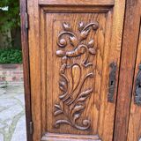 Low carved wooden sideboard