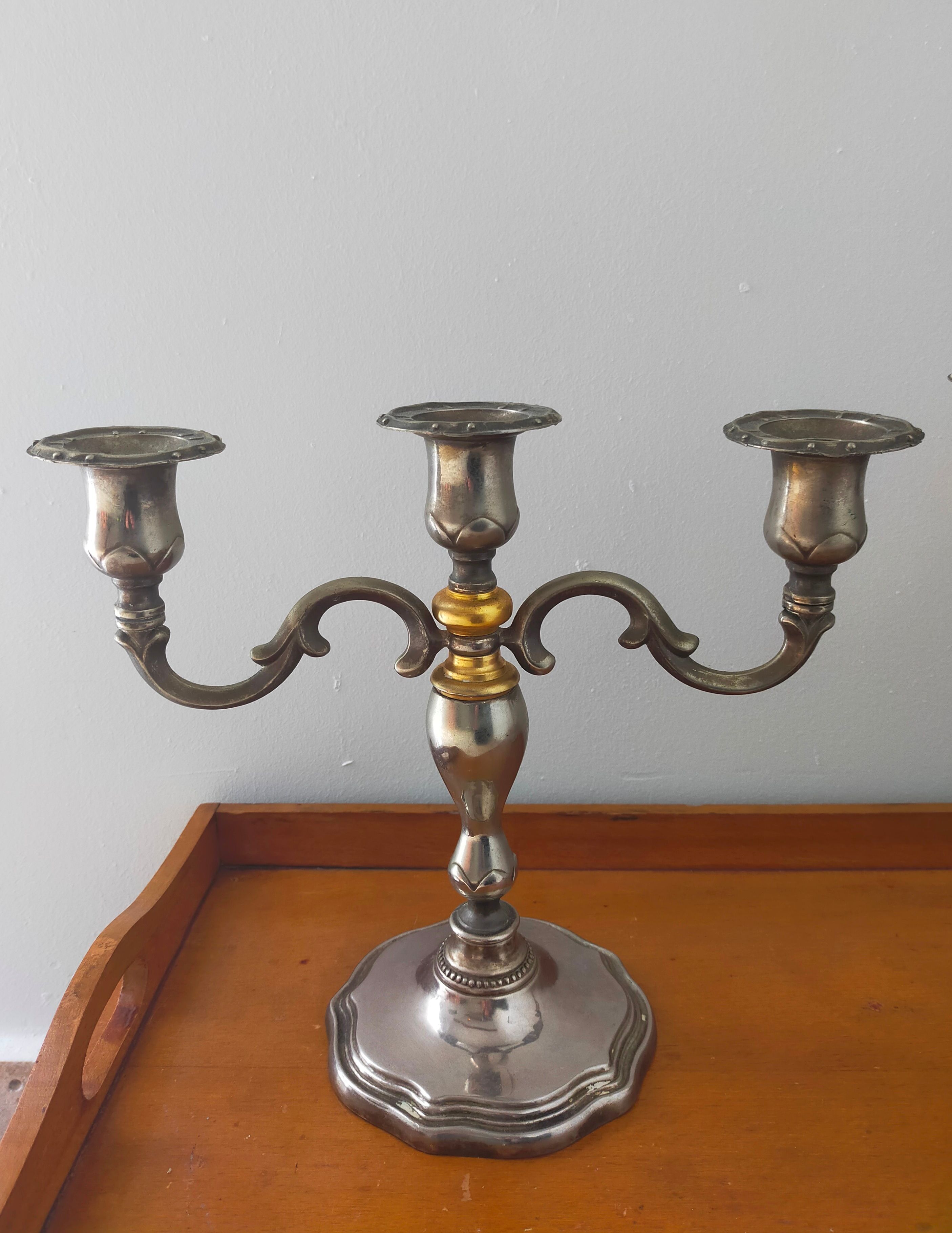 Pair of silver metal candlesticks