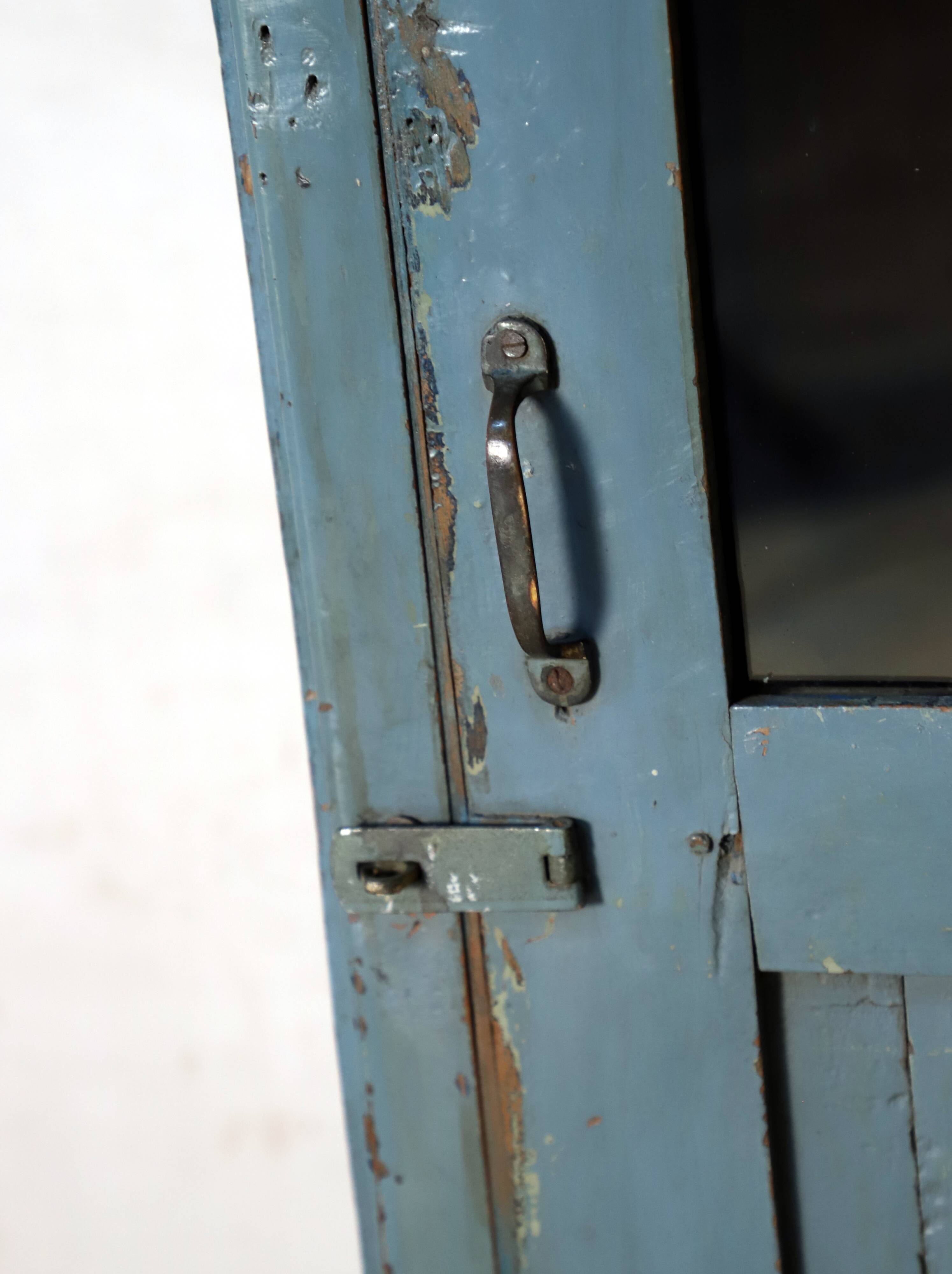 Burmese teak glass cabinet with original blue-gray patina