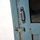 Burmese teak glass cabinet with original blue-gray patina