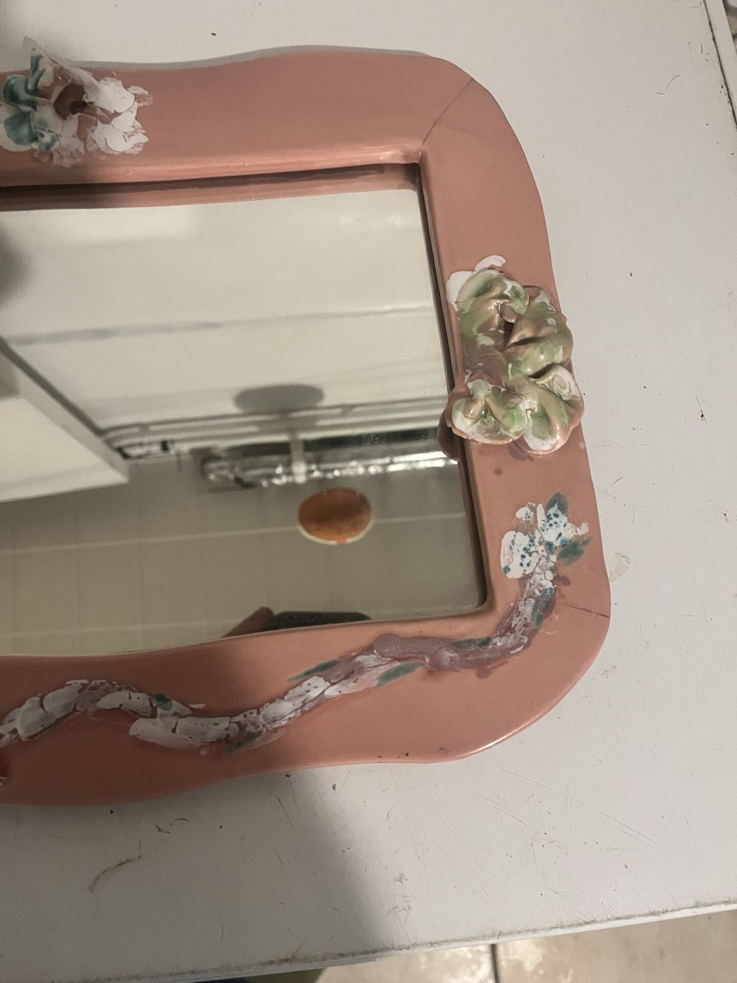 Vintage floral pink ceramic framed mirror signed St-Avit Francalat.