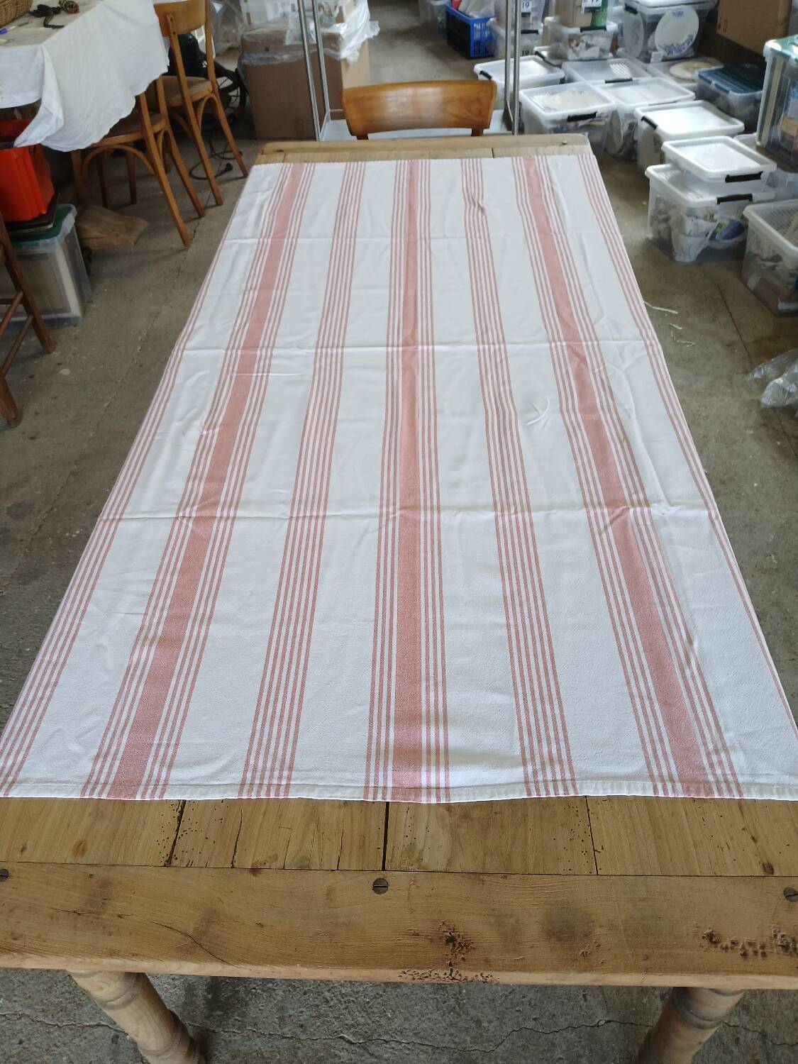 Old pink and white tablecloth