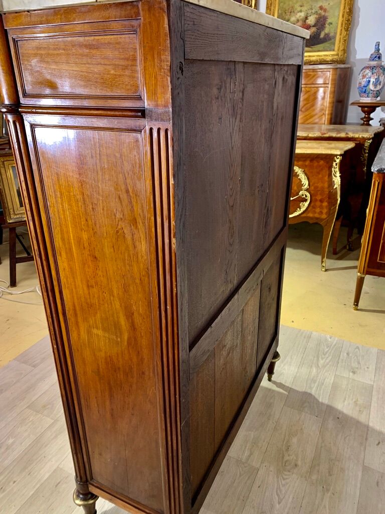 Secretary Louis XVI 1780 in Mahogany, white marble.