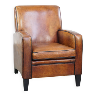 Fauteuil en cuir de mouton au design Art Déco avec une superbe patine