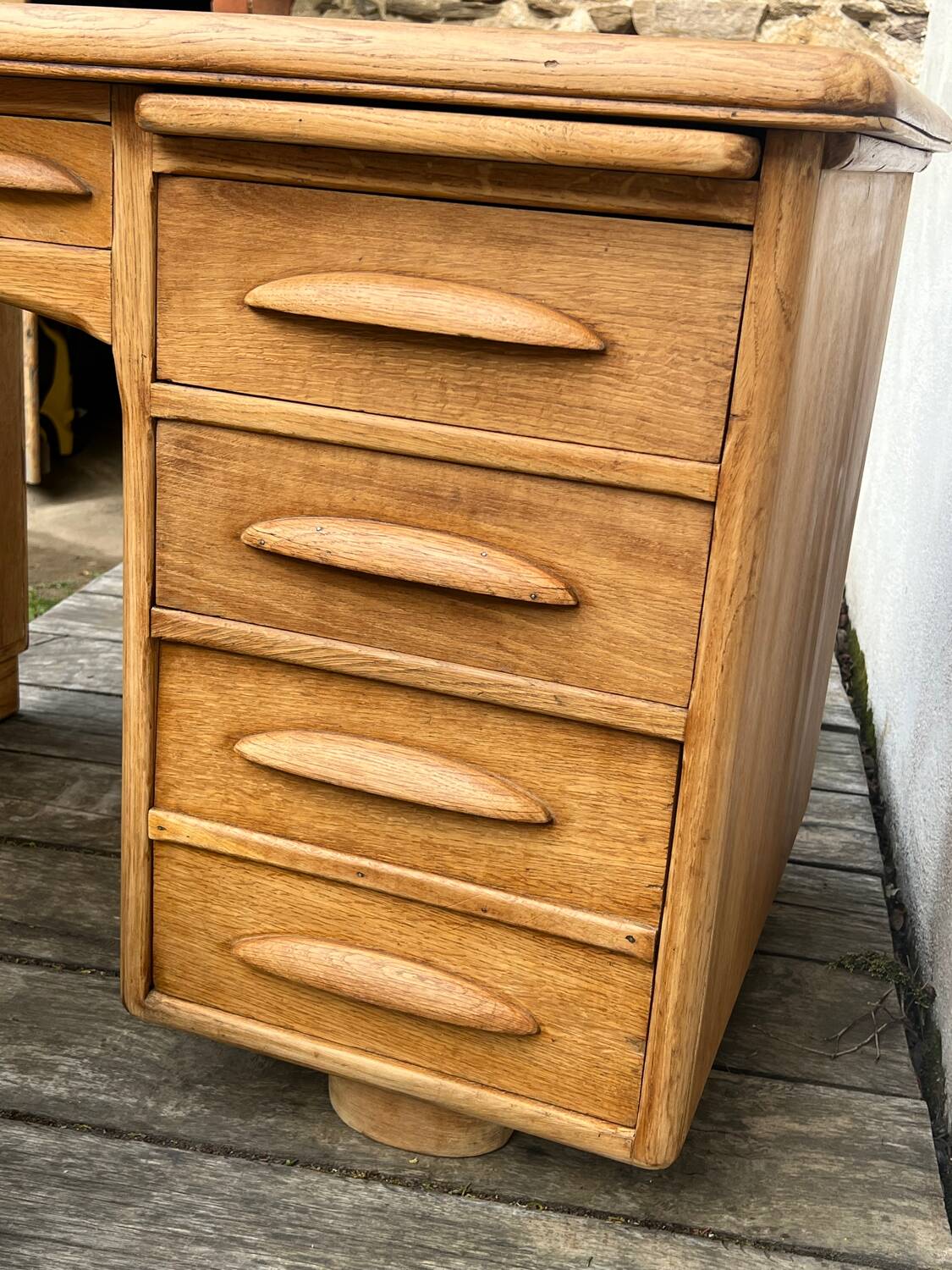 Antique light oak desk from the 1950s with 4 drawers