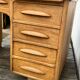 Antique light oak desk from the 1950s with 4 drawers