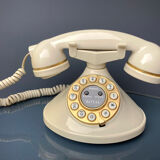 Téléphone à forme design écru et dorée