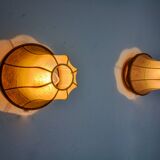 Pair of "cocoon" wall lights, pear shape, resin and pine, Italy, 1970