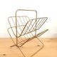 Vintage gold metal magazine rack