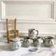 Vintage stoneware dinette with flower decor