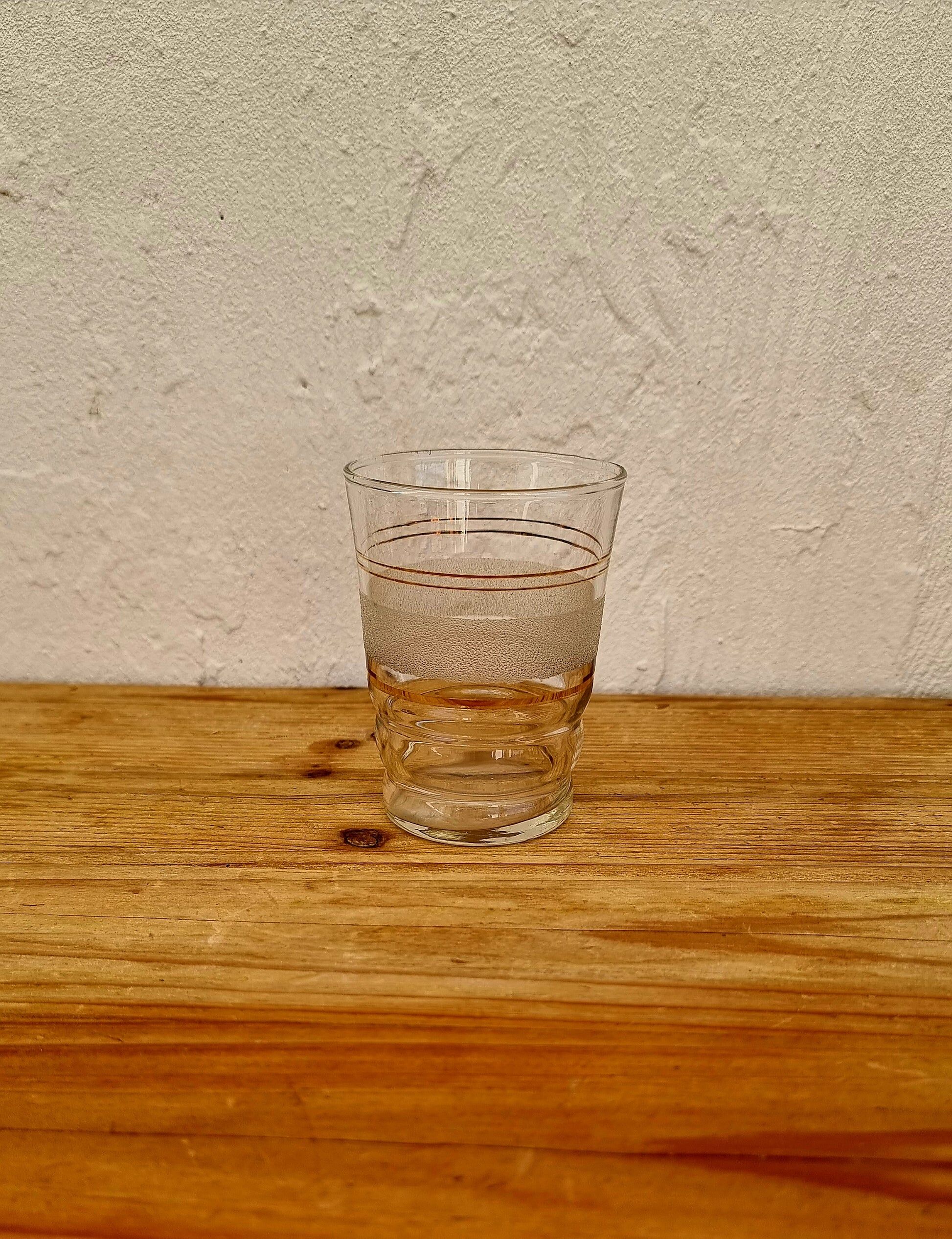 Set of 5 vintage white and gold granite glasses