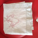 Handmade red lettered pillowcase.
