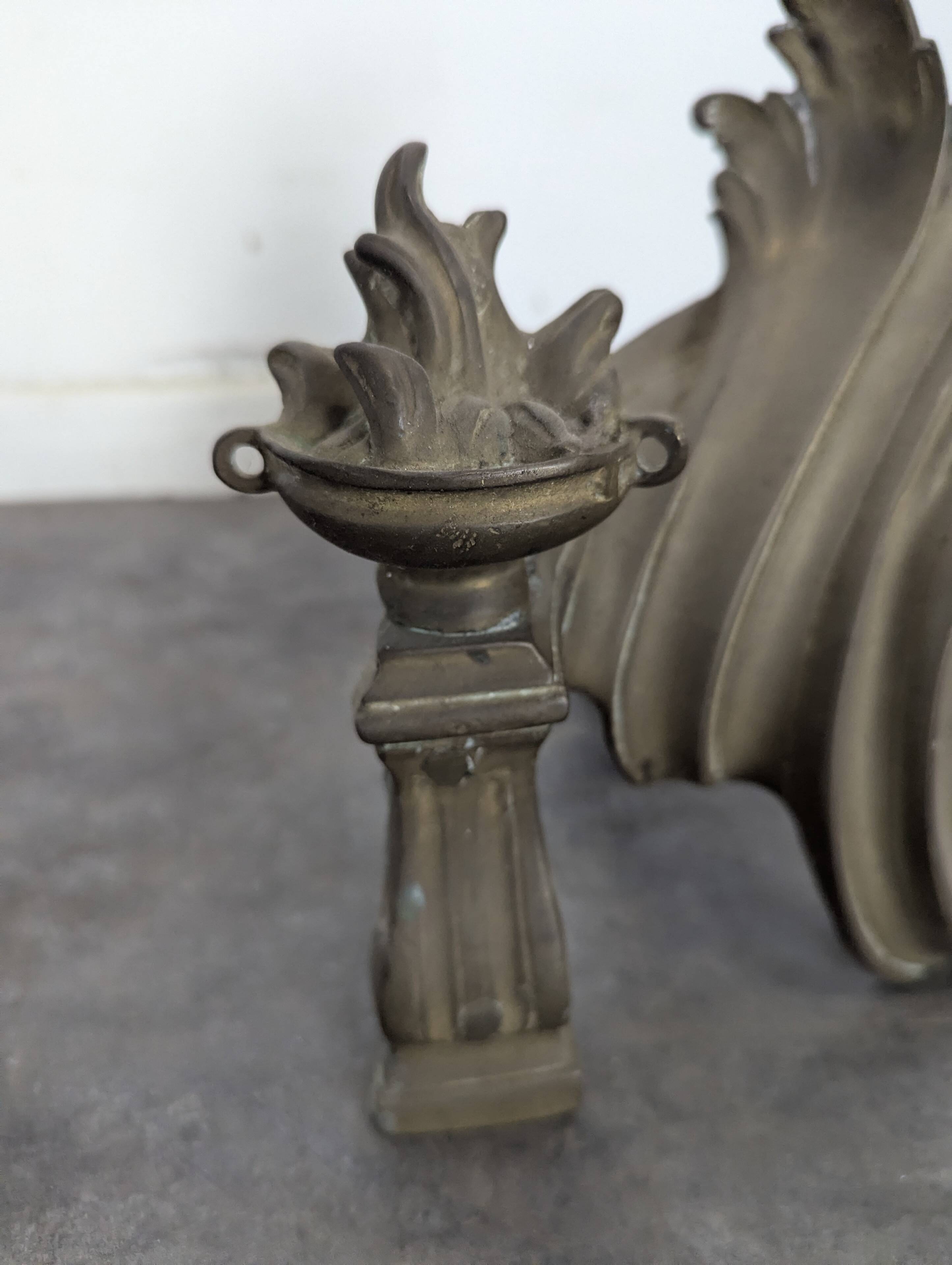Pair of rocaille bronze andirons in Louis XV style