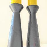 Pair of design black wooden candlesticks with its apparent veining