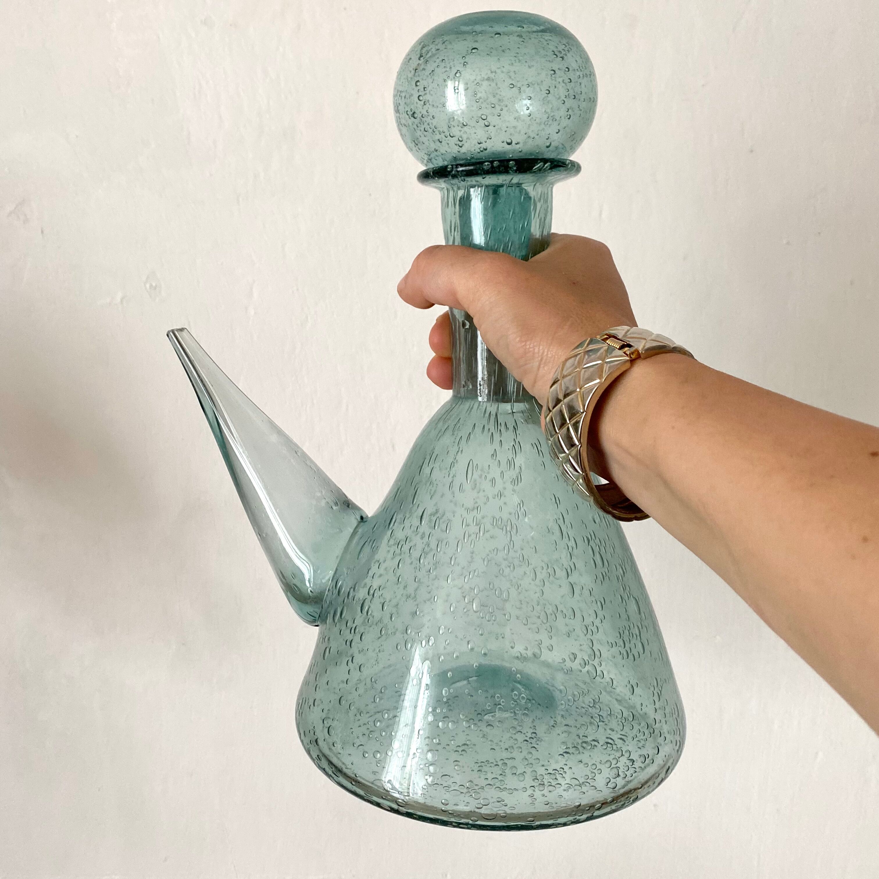 Antique wine decanter, bubbled glass porron