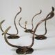 Four patères bronze patinated leafy décor early 20th century