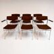 Set of 6 stackable chairs in rust colour by Gijs van der Sluis, 1970s.