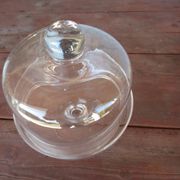 Old glass cake dome on a stand