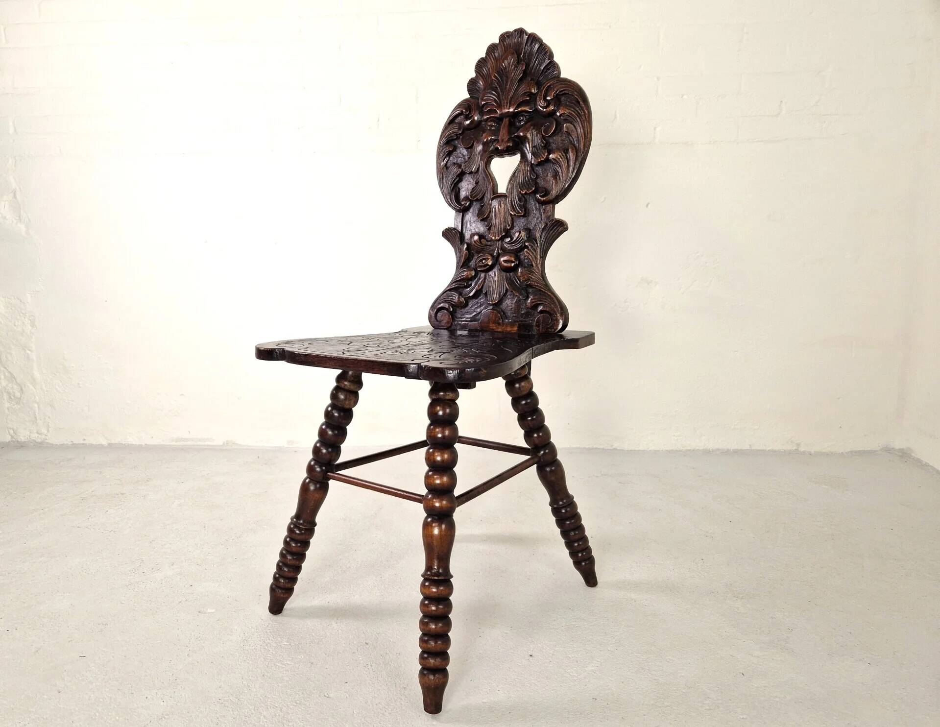 Antique Gothic hall chair with bobbin legs