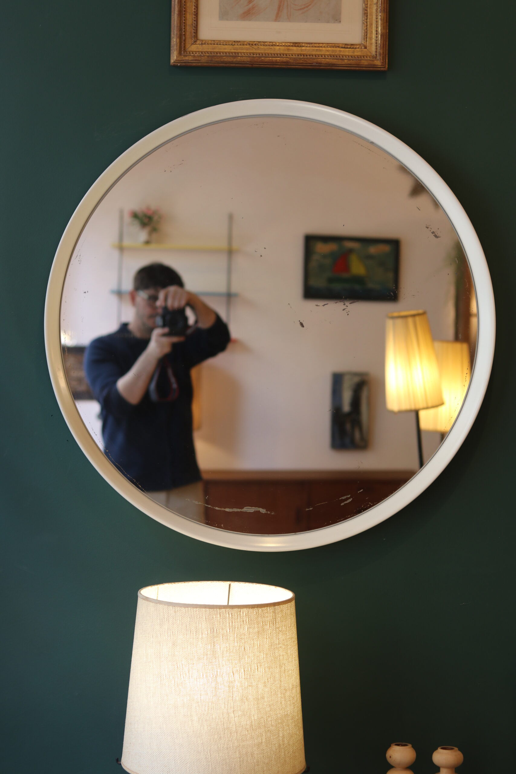 Large vintage circular mirror, plastic frame.