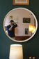 Large vintage circular mirror, plastic frame.