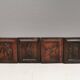 Four old wooden carvings to hang on the wall.