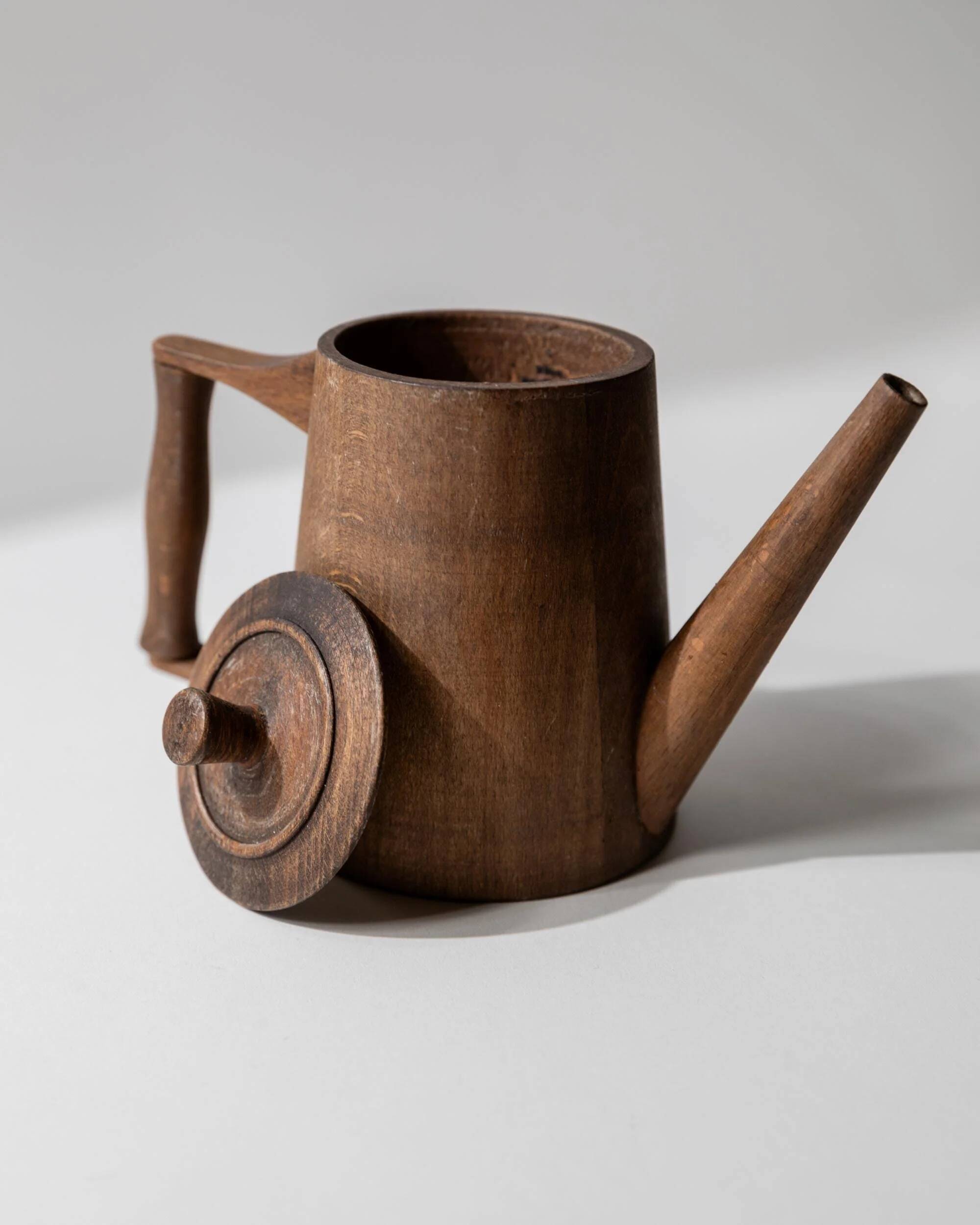 Vintage wooden pitcher from the 1960s, hand-carved.