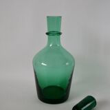 Set of a carafe and 4 designer glasses in green glass from the 70s