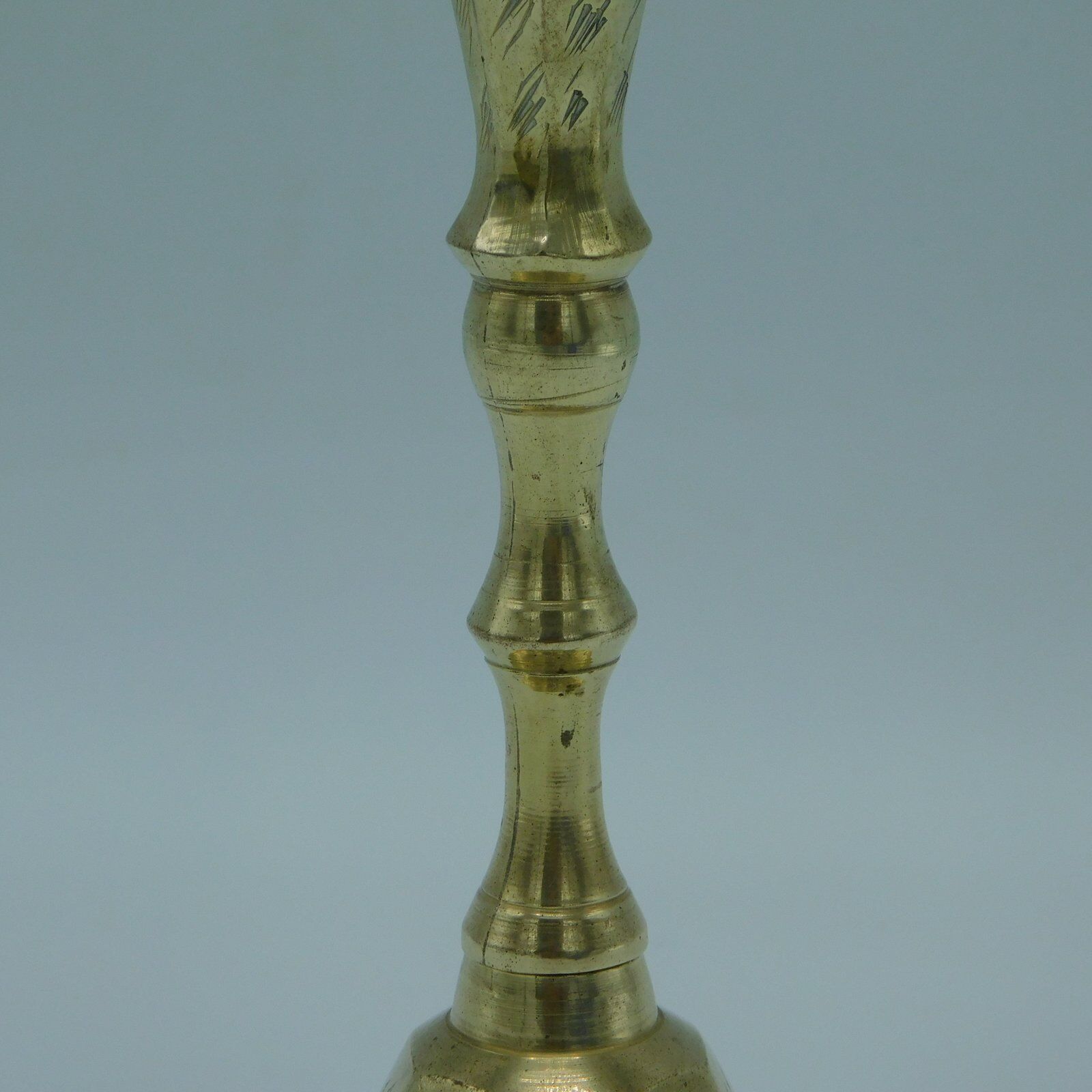 Engraved brass candlestick